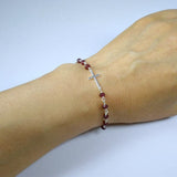sideways cross bracelet garnet beads sterling silver