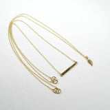 gold layered necklace bar leaf