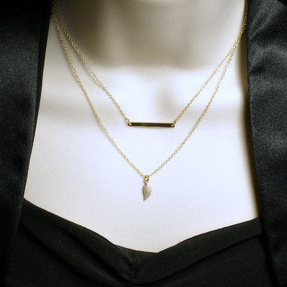 gold layered necklace bar leaf