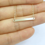 gold layered necklace bar leaf