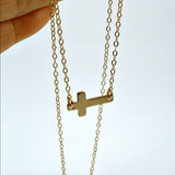 gold sideways cross necklace simple minimal