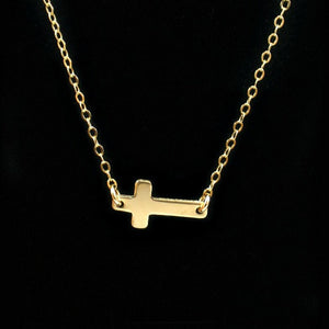 gold sideways cross necklace simple minimal