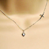 sterling silver sideways cross necklace with heart charm