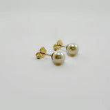 tiny pearl stud earrings gold